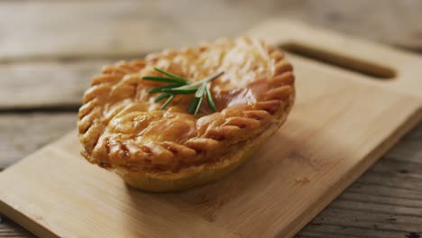 video of pie seen from above on wooden background