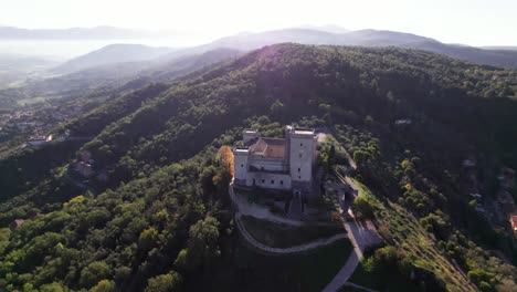 aerial panorama of medieval fortress of narni on top of a green hill