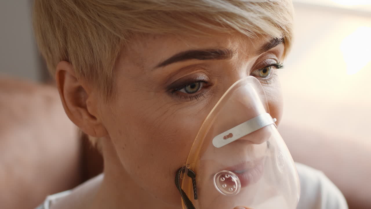 Woman Wearing Oxygen Mask