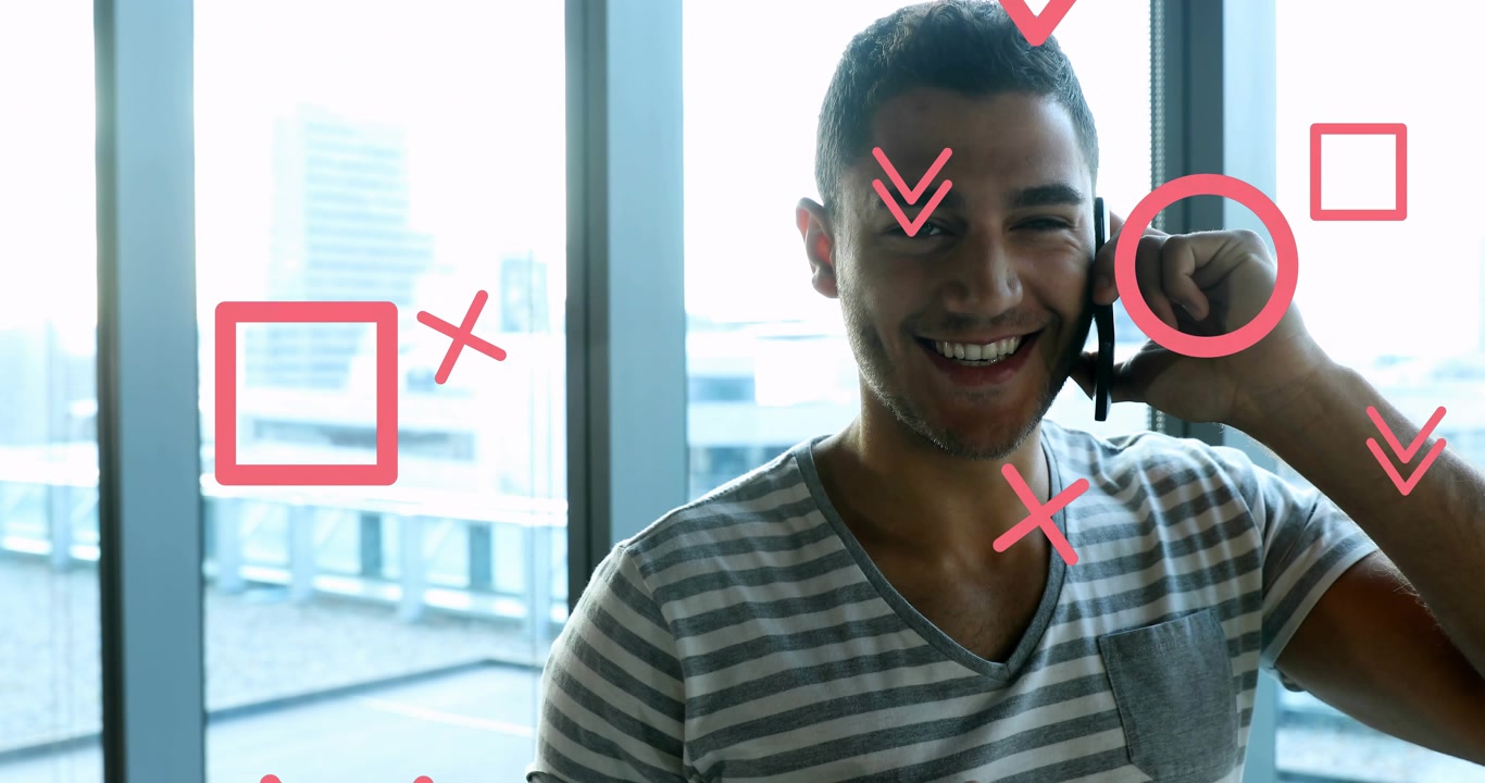 Man lifting phone beside tall window, animated waveforms pulsing during tech call against skyline