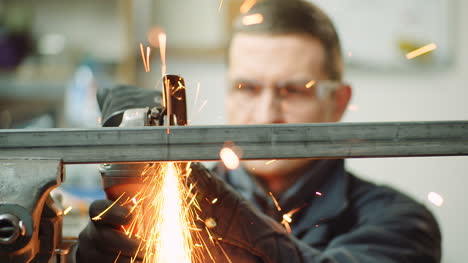 angle grinder cutting metal at workshop 33