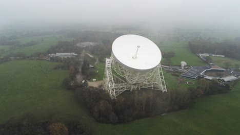 aerial jodrell bank observatory lovell telescope misty rural countryside high orbit right