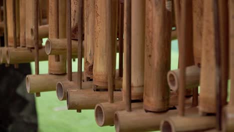 sliding shot : row of angklung traditional musical instrument