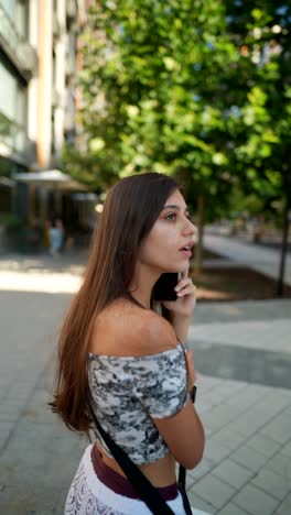 woman walking through the city with luggage