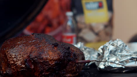 smoked pork shoulder on a grill