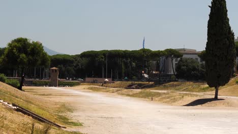 Circus-Maximus-and-Torre-della-Moletta-tower-in-the-background,-Rome,-Italy