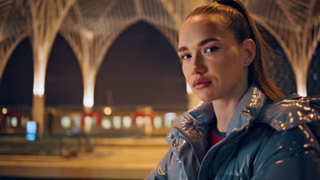 lonely woman standing urban gothic architecture evening closeup. girl night city