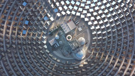 Abstract top aerial shot over a solar power tower Spain Gemasolar mirrors