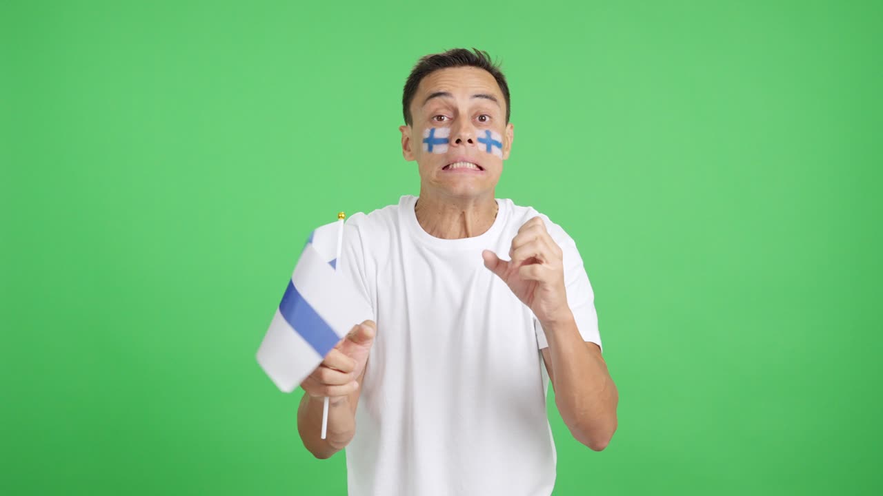 Man cheering for Finland during a match that is lost