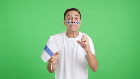 man cheering for finland during a match that is lost