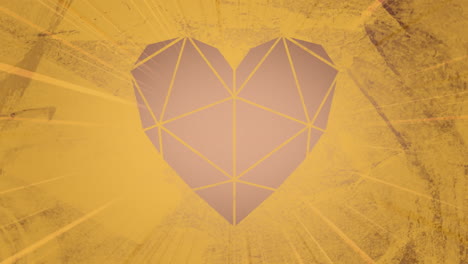 faceted heart against textured yellow background