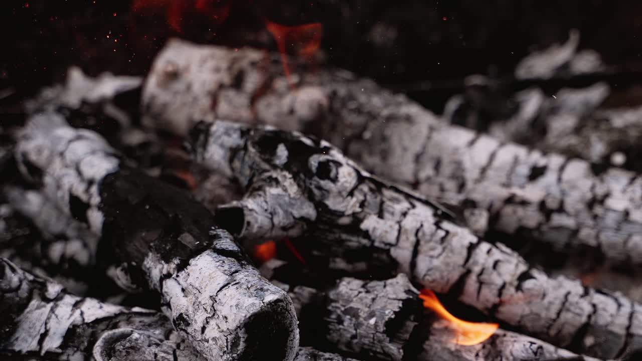 Flame of fire on nature. Close up of burning coals in barbecue grill