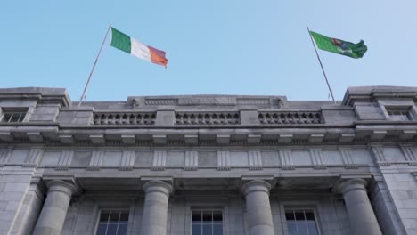 slow motion of irish flag waving in the wind on saint patrick's day in ireland, cork