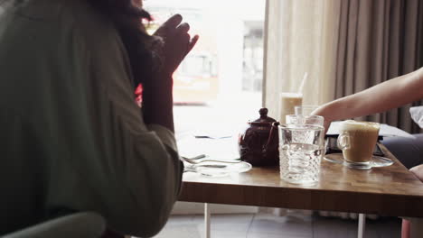 business meeting in cafe using digital tablet social network data concept