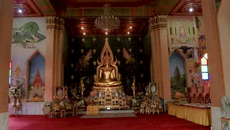 golden buddha statue at monastery from flat angle video taken at thai monastery bodh gaya bihar india on feb 11 2020.