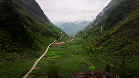 hmong village in meo vac valley between mountains in ha giang, vietnam