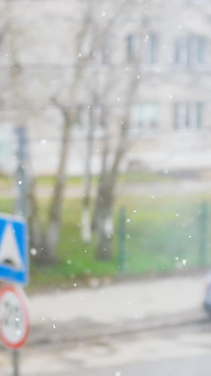 Snowfall outside a building