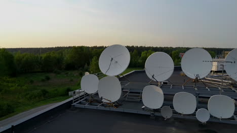 satellites dishes transmitting and receiving digital television broadcast signals