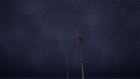 wind turbines under a starry night sky