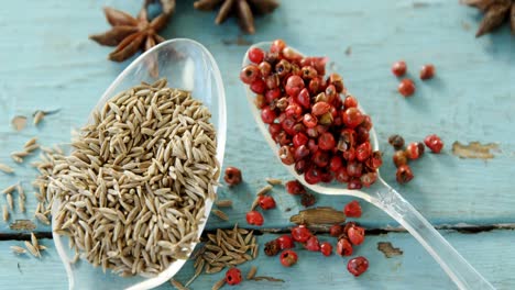 various spices on wooden table 4k