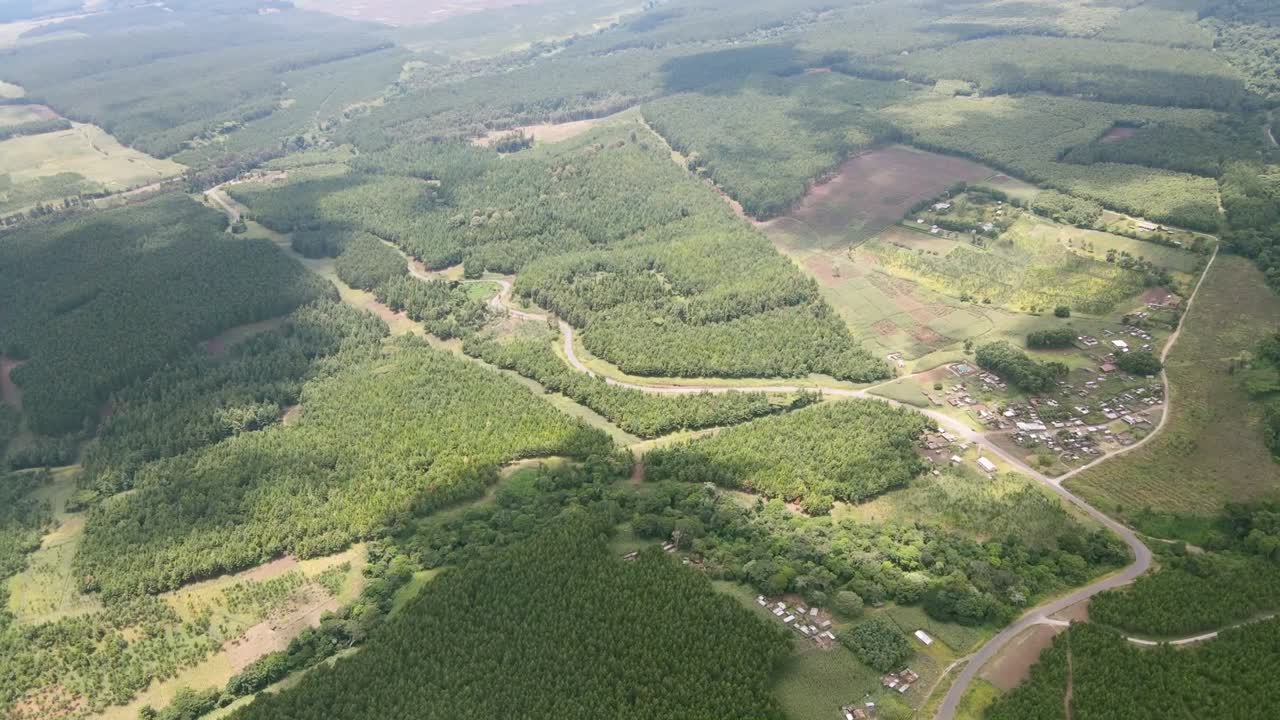 drone view-city scape of the roads passing in between the forest of Kilimanjaro Slopes of kenya