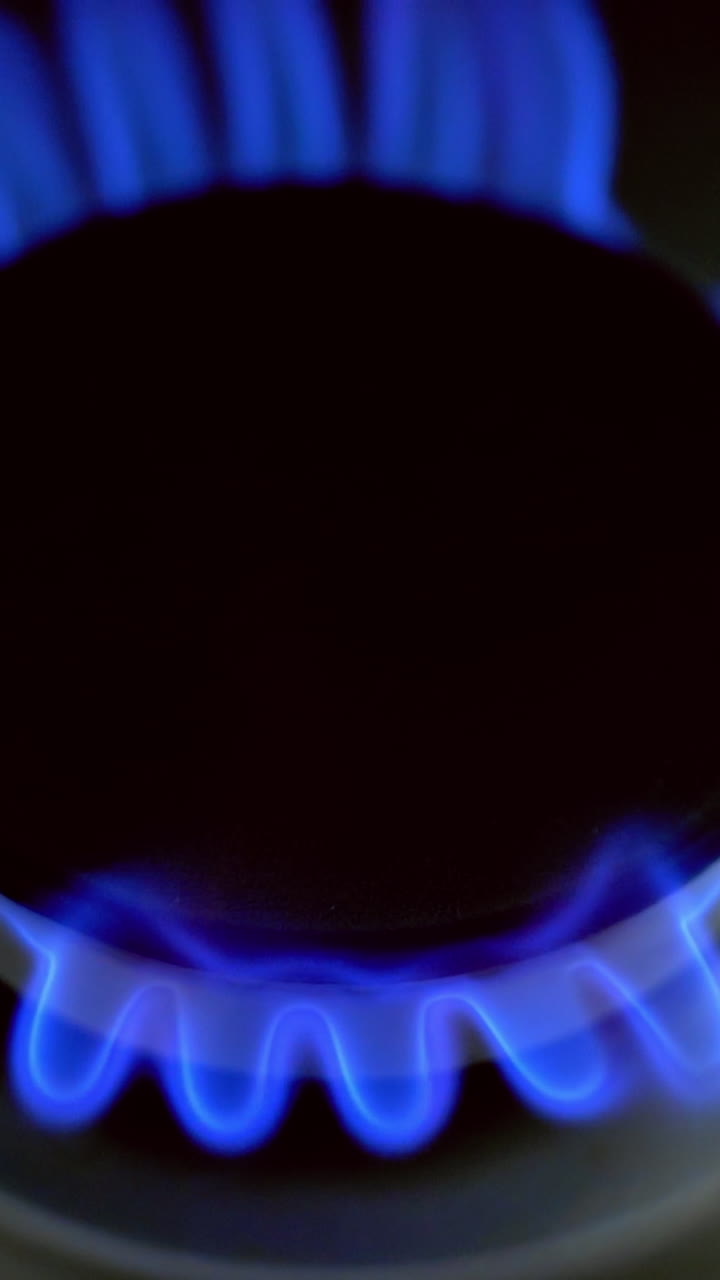 Fire from gas kitchen stove. Gas burner on modern kitchen stove