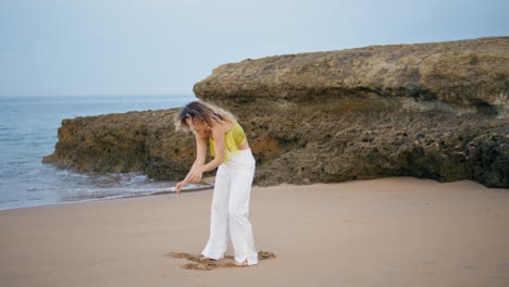 modern performer dancing beach summer day. flexible woman performing dance