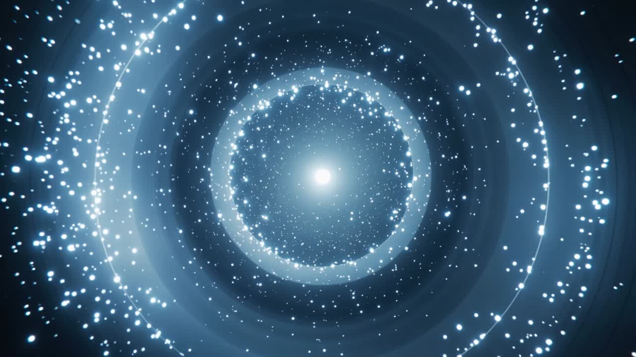 ループ再生が始まり、光るリングが宇宙の渦の中で回転し、コアと粒子が脈動している。