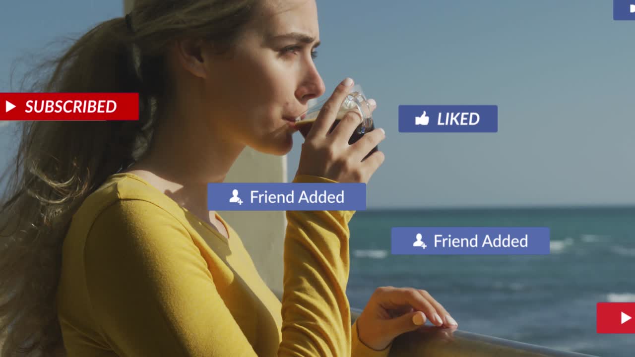 Animation of social media notifications over woman on holiday drinking coffee by the sea