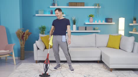 the man who cleans his house alone, laughing, having fun, talking to himself.