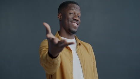 man posing with smiling expression