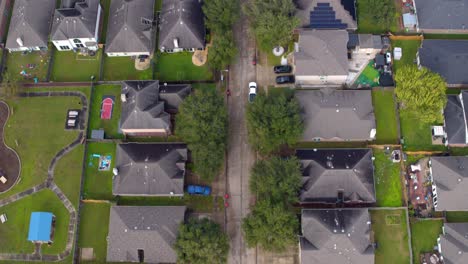 high angle drone view of suburban homes in sugar land, texas