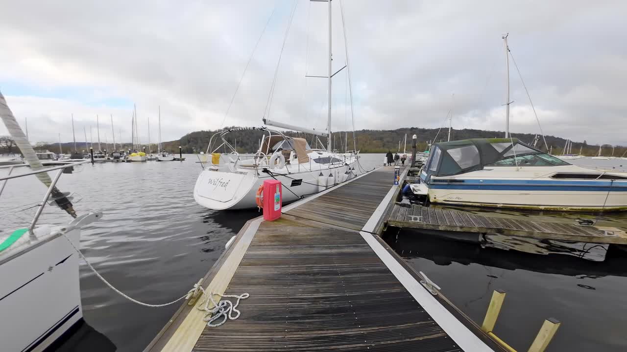 Boats, sailing ships, moored on the harbor of Bowness-on-Windermere