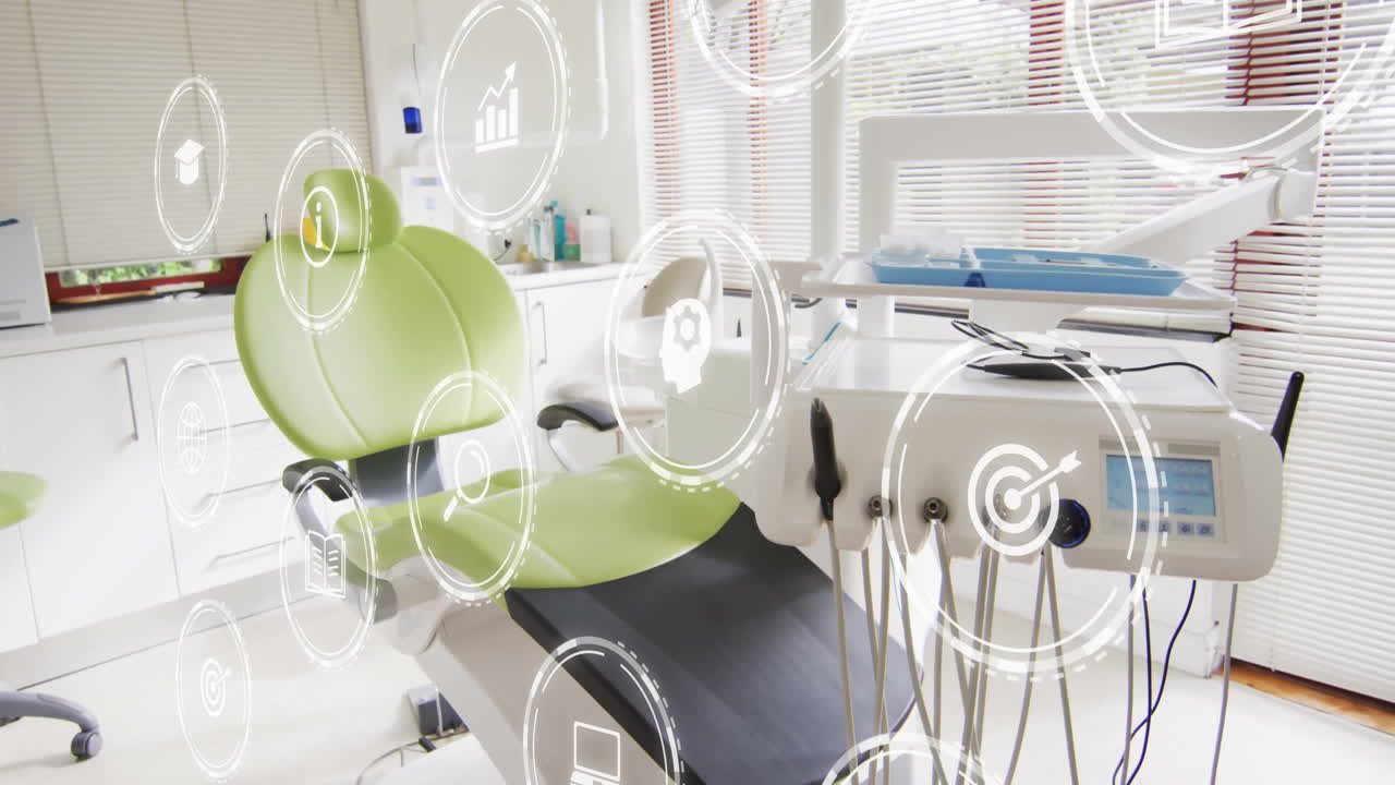 In dental office, green chair with animation overlaying medical equipment