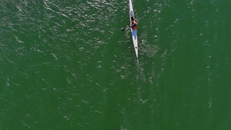 birds eye view of a person kayaking at lagoon beach in cape town south africa