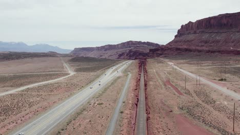 Interstate-Highway-191-Freeway-Road-into-Deserts-of-Moab,-Utah---Aerial