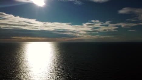 drone view of a bright sunlight over the water