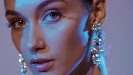 close-up portrait of a woman with luxurious jewelry