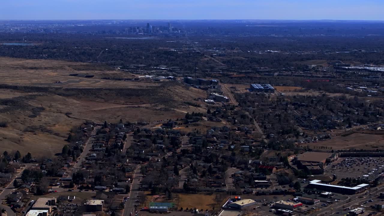 Lookout Mountain Golden Downtown Denver cityscape from North Table Mesa aerial drone Colorado daytime winter sunny clouds neighborhood Front Range Rocky Mountains Arvada Lakewood forward pan up motion