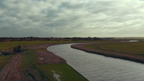 Steady-right-to-left-panning-aerial-of-the-Norfolk-Broads-on-an-overcast-day