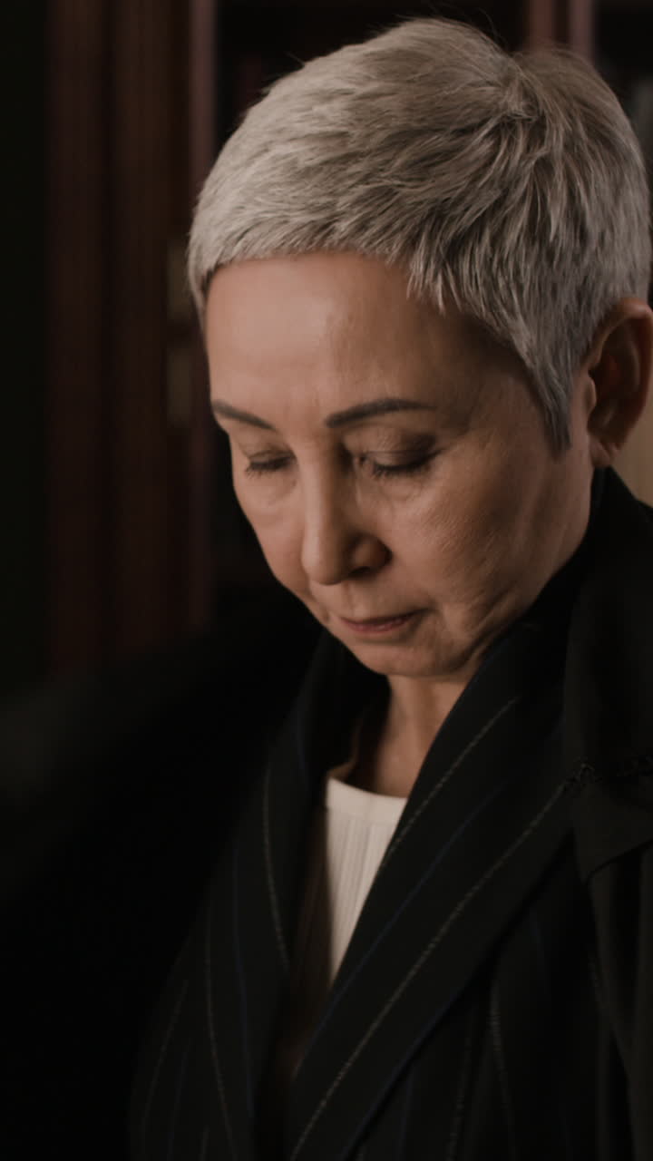 Senior Woman in a Black Coat