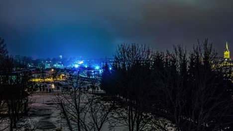 Timelapse-over-a-city-with-night-lights-with-fireworks