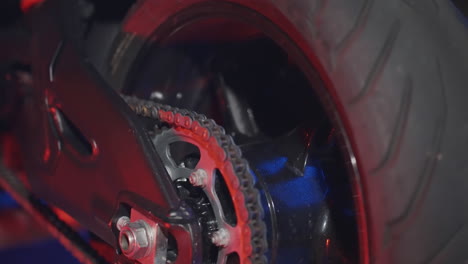 close-up of motorcycle chain and wheel