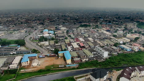 pull back aerial view of the surulere residential and commercial district of mainland lagos, niger in west africa