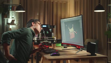 man working on 3d design at night