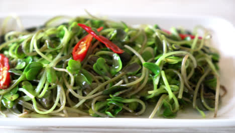 fried sunflower sprout with oyster sauce