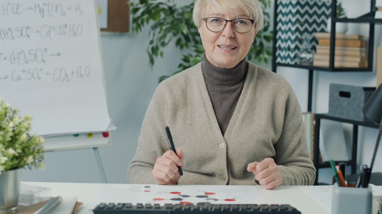 Chemistry Lesson with Teacher Presenting Molecular Structures
