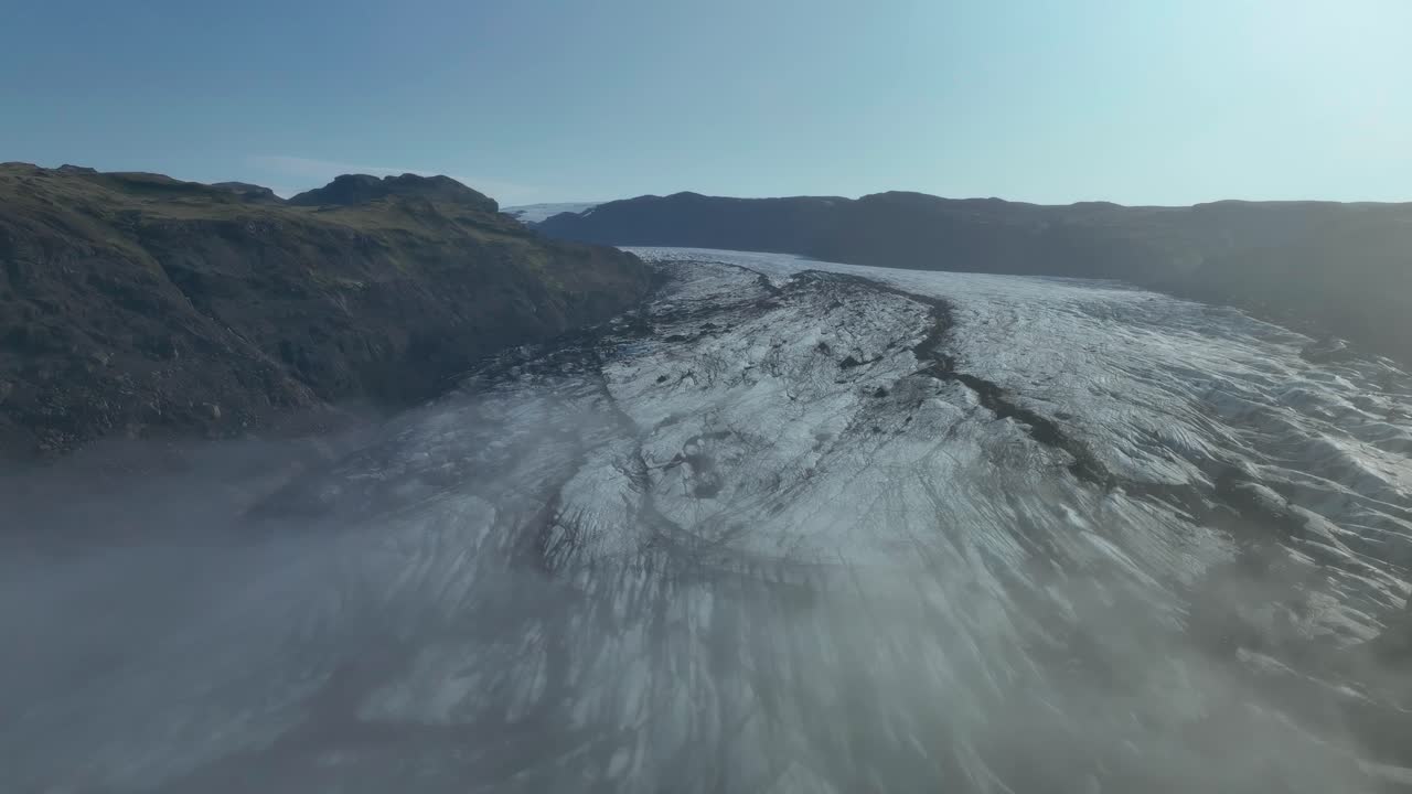 S&oacute;lheimajokull Glacier, South Iceland - Cloaked in Morning Mist - Aerial Pullback