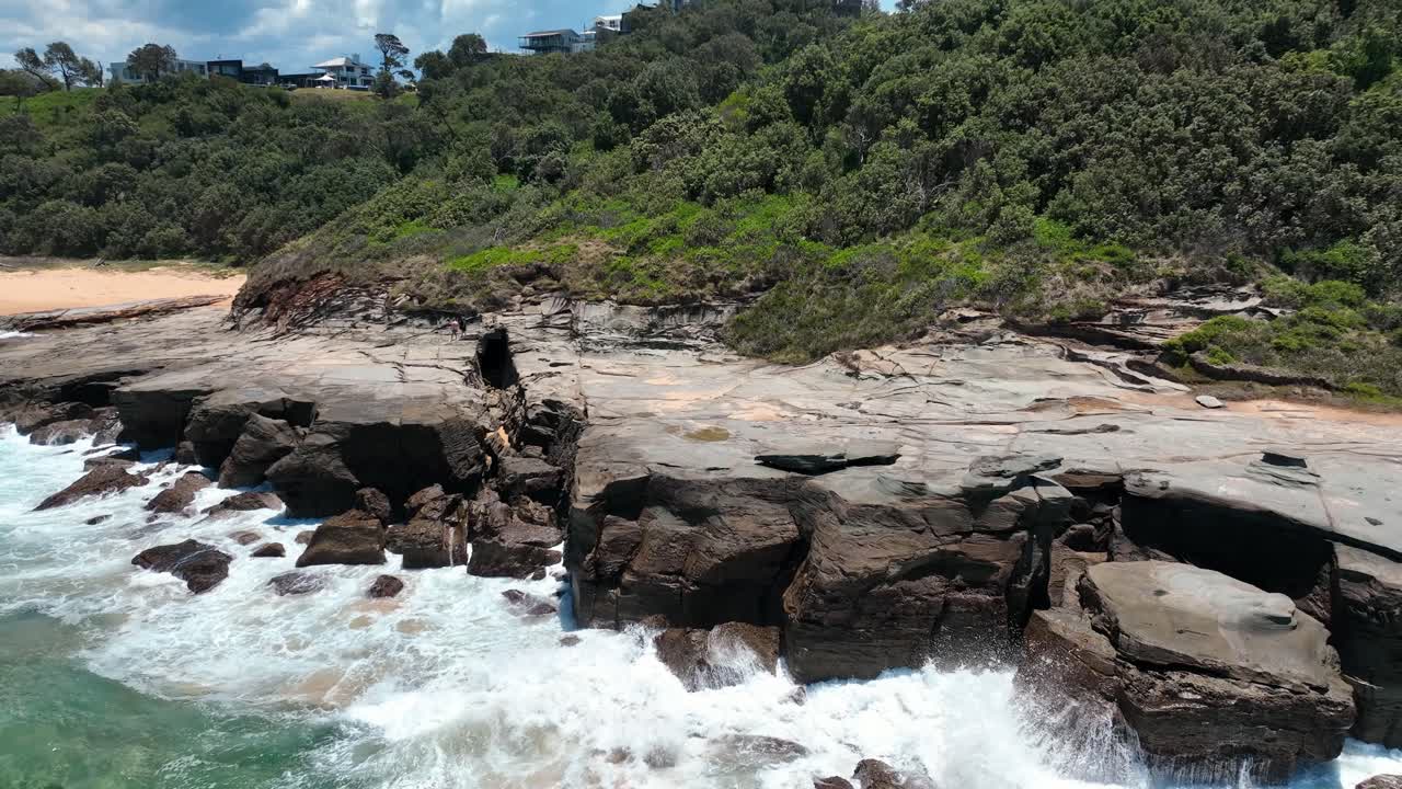 Nature's Contrast: Spoon Bay's Rocky Coastline Alongside Wamberal Beach, an Aerial Snapshot of Central Coast, NSW