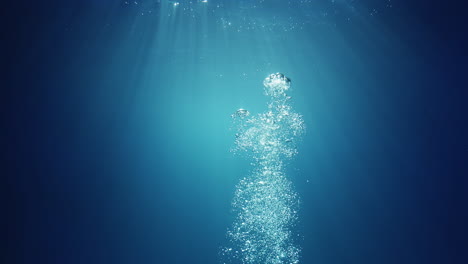 Unterwassersonnenstrahlen,-Die-Von-Oben-Scheinen,-Kommen-Durch-Das-Kristallklare-Blaue-Wasser-Und-Verursachen-Einen-Wunderschönen-Wasserbeleuchtungsreflexionsvorhang-Mit-Luftblasen,-Die-An-Die-Oberfläche-Steigen